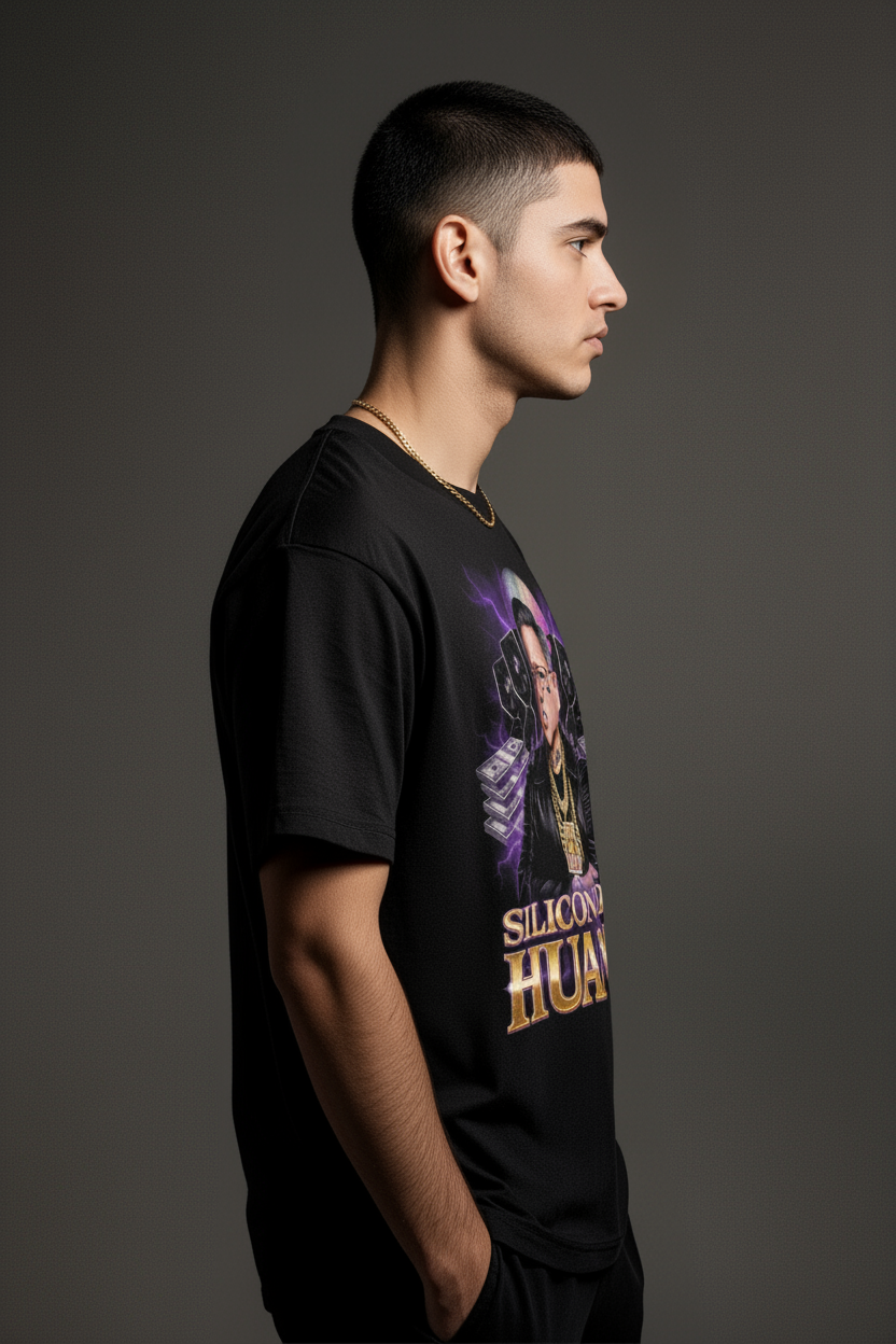 Side-profile of model wearing black Silicon Don Huang t-shirt, showing sleeve and side of Jensen Huang graphic with gold chain; cool tech meme tee