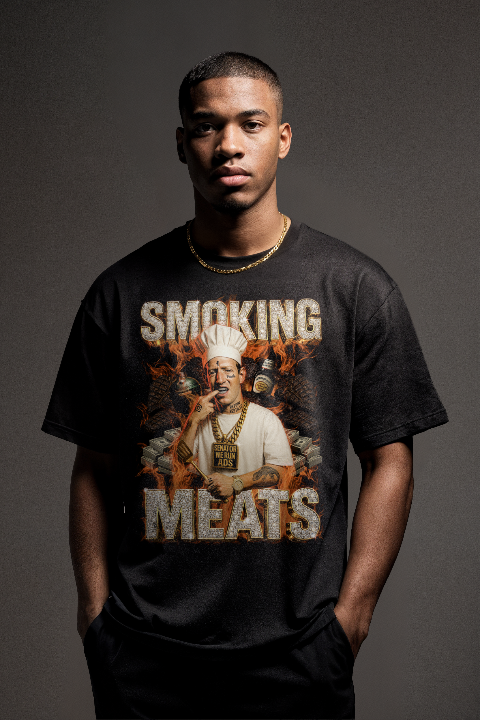Model wearing black 'Smoking Meats' t-shirt with chef graphic, flames and bottles; funny BBQ meme tee for grill enthusiasts